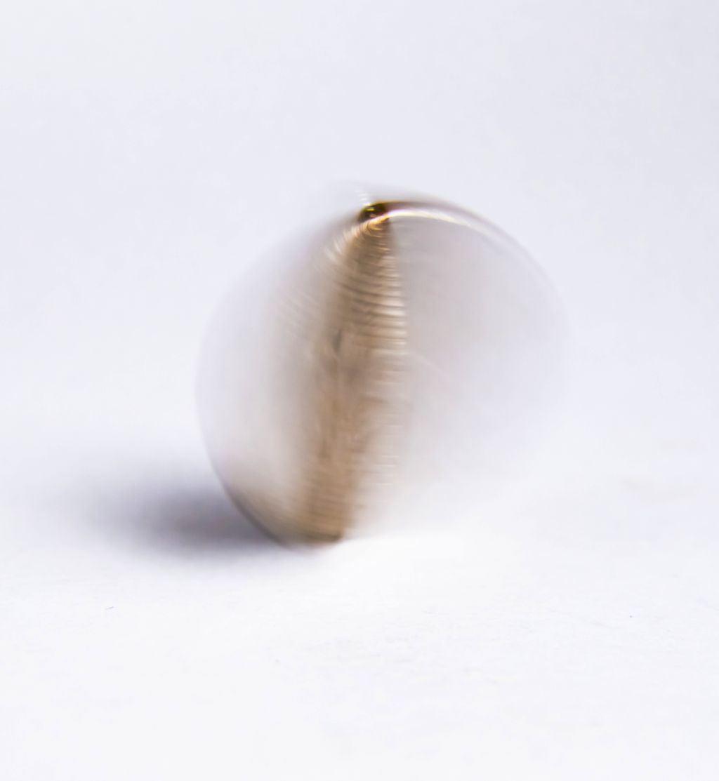 invest_spinning_coin_975x1060